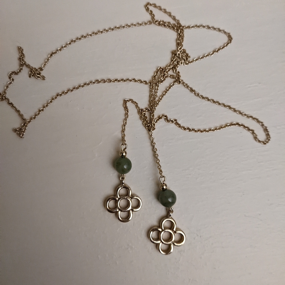 Vintage 32" gold tone necklace with two green glass beads